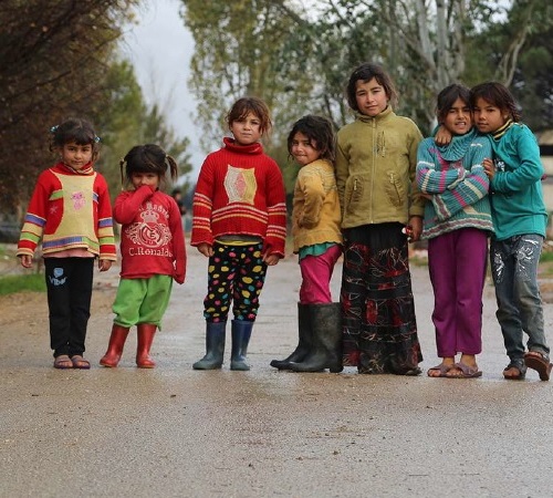 Children standing together outdoors